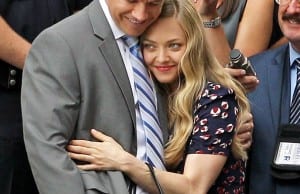 John and Samantha embrace.