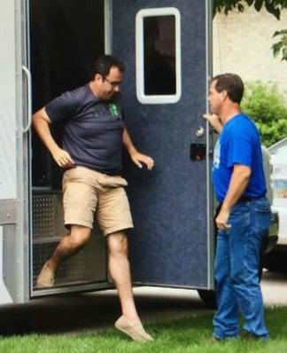 Jared Fogle, steps out of police evidence truck.