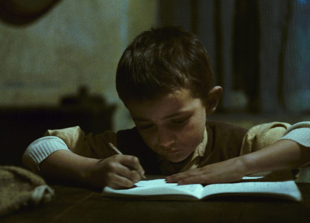 Omar Brignoli as Minek, the young peasant boy sent to school in The Tree of Wooden Clogs. Photo courtesy The Criterion Collection.